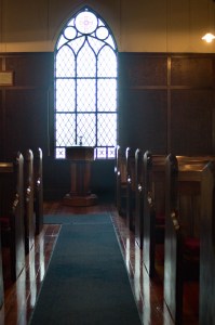 St David's interior - looking down aisle towards stained glass window
